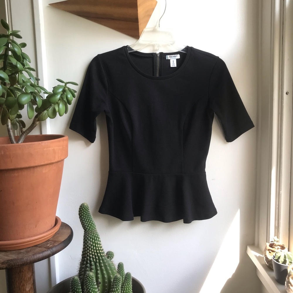 Zip back peplum top with mid-length sleeve